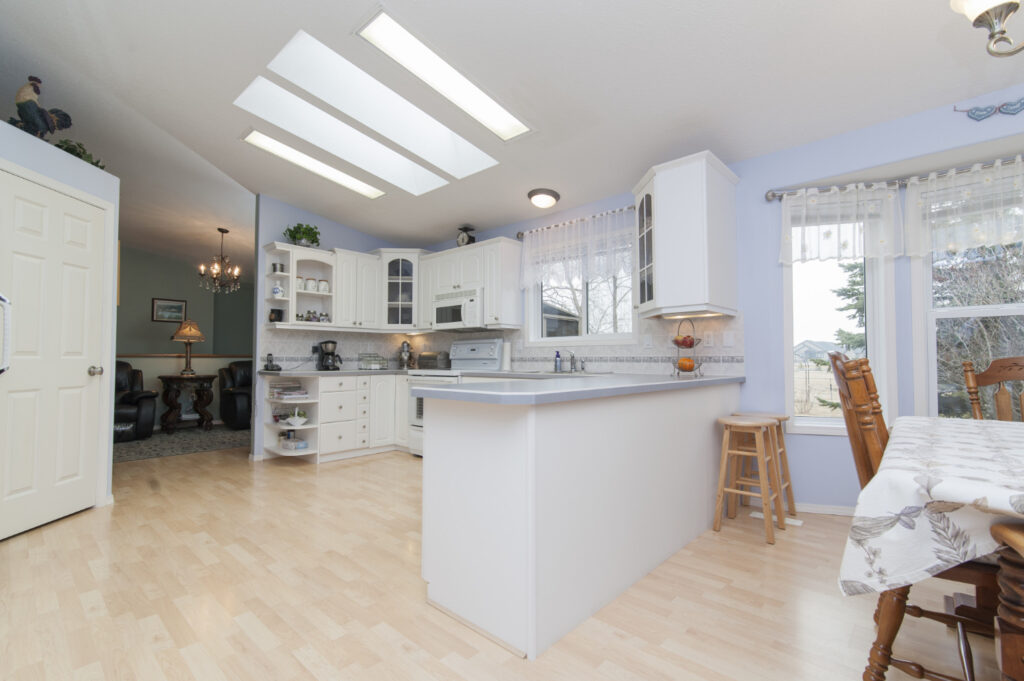 open plan kitchen with beautiful lighitng